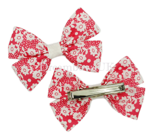 Pink and white floral hair bows, alligator clips