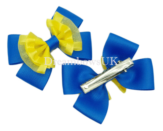 Royal blue and yellow school hair bows, alligator clips