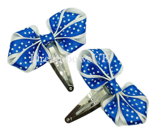 Polka dot hair bows on snap clips