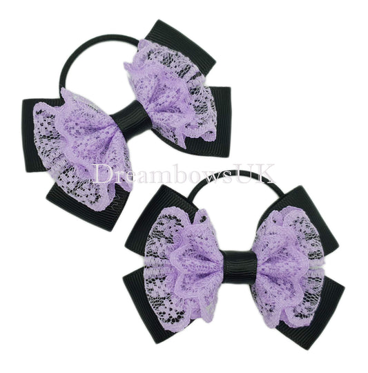 Black and lilac lace hair bows on thin bobbles