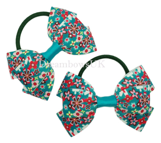 Turquoise floral hair bows on thick bobbles