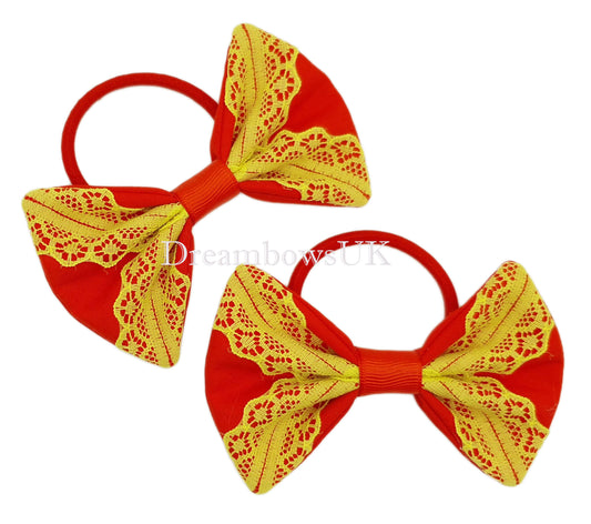 Red and yellow lace hair bows on thick bobbles
