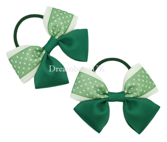 Bottle green and white polka dot hair bows on thick bobbles