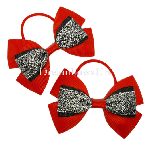 Red and black glitter hair bows on thin bobbles