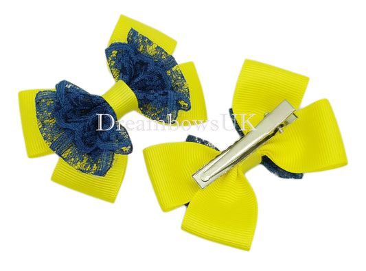 Navy blue and yellow lace hair bows on alligator clips