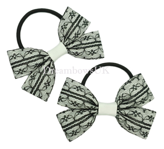 Black and white lace hair bows on thick bobbles