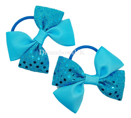 Turquoise diamante bows on thick bobbles