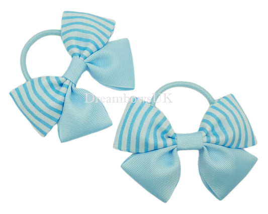 Baby blue and white striped bows on thick bobbles