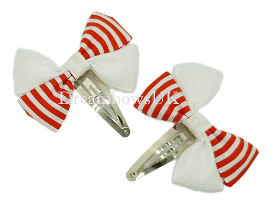 Red and white striped bows on snap clips