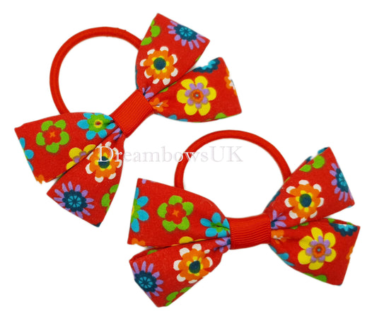 Red floral hair bows on thick bobbles