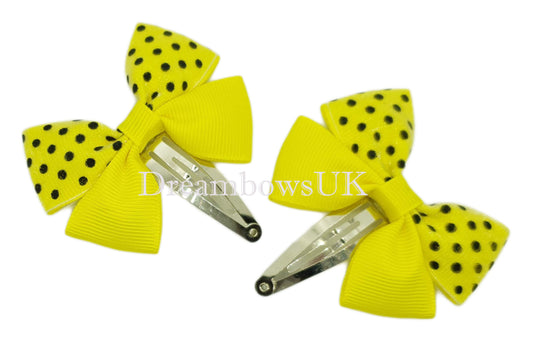 Yellow and black spotty hair bows, snap clips