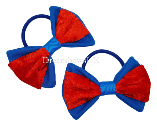 Royal blue and red velvet bows on thick bobbles