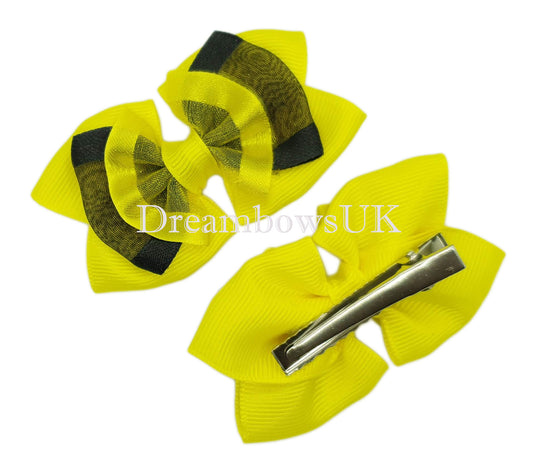 Yellow and black hair bows, crocodile clips