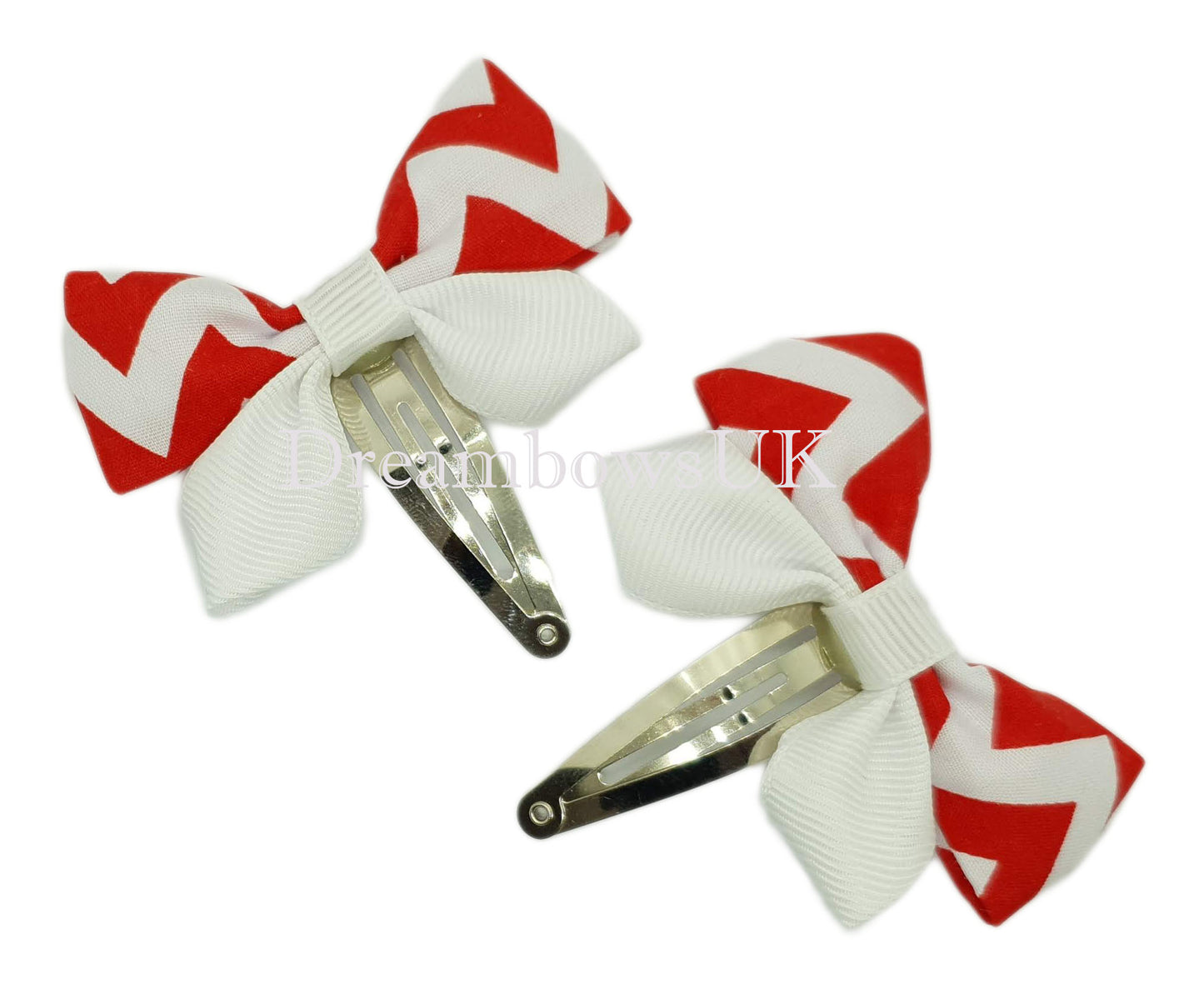 Red and white hair bows on snap clips