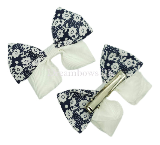 Navy blue and white bows on alligator clips