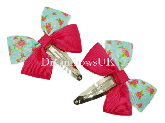 Cerise pink floral bows on snap clips
