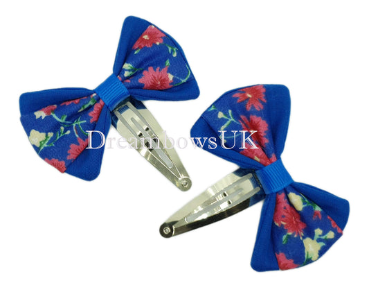Blue floral hair bows on snap clips