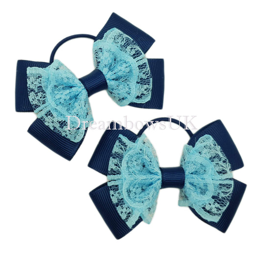 Blue lace hair bows on thin bobbles