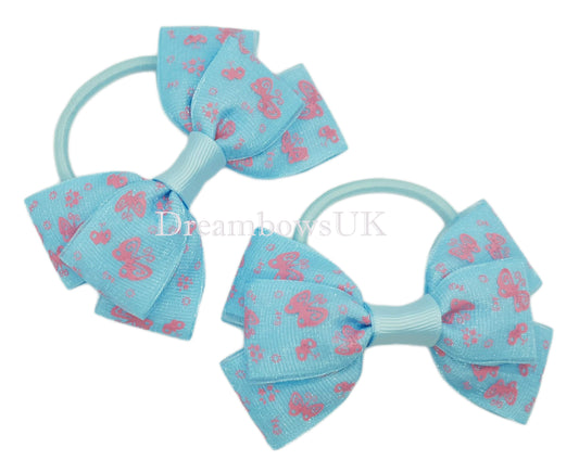Adorable Baby Blue and Pink Butterfly Design Hair Bows – 9cm x 6cm Pair on Thick Bobbles
