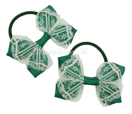 Bottle green and white lace hair bows on thick bobbles
