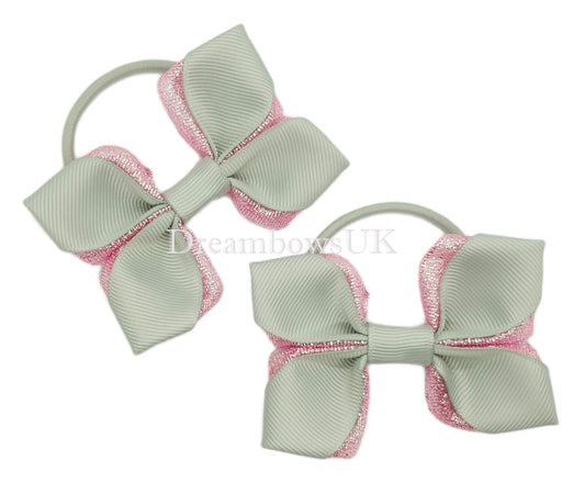Baby pink and silver glitter hair bows on thick bobbles