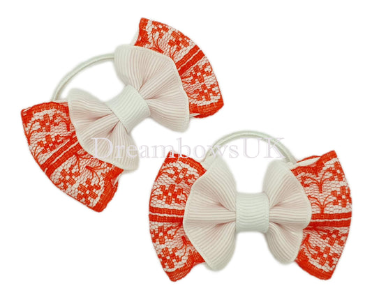 Red and white lace hair bows on thin bobbles