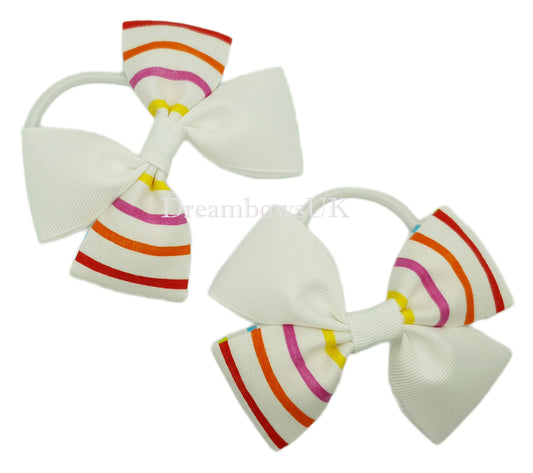 Colourful striped hair bows on thick bobbles 