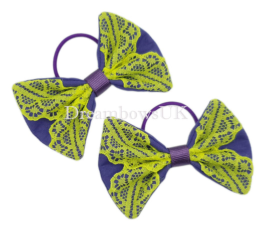 Purple and yellow lace hair bows on thin bobbles