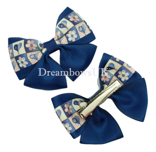 Navy blue floral bows on alligator clips