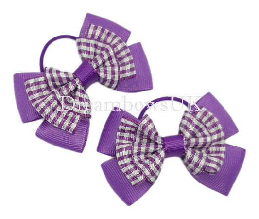 Purple gingham hair bows on thin bobbles