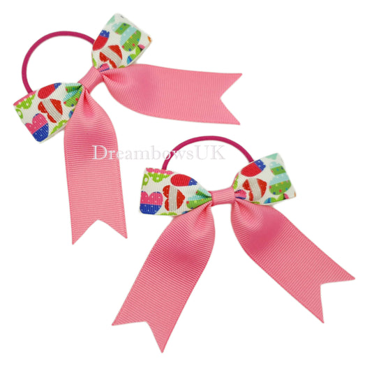 Hot pink hearts design bows on thin bobbles