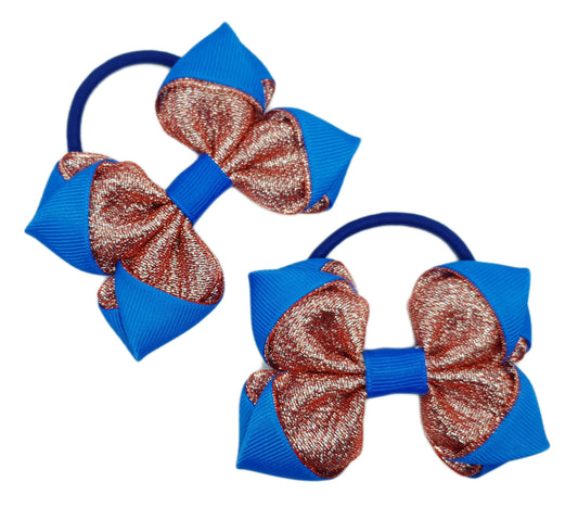 Royal blue and red glitter hair bows on thick bobbles