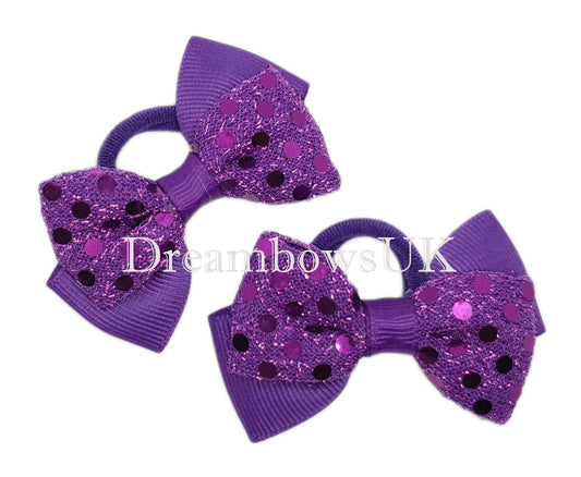 Purple diamante hair bows on polyester bobbles