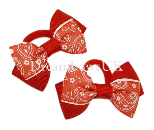 Red paisley hair bows on polyester bobbles