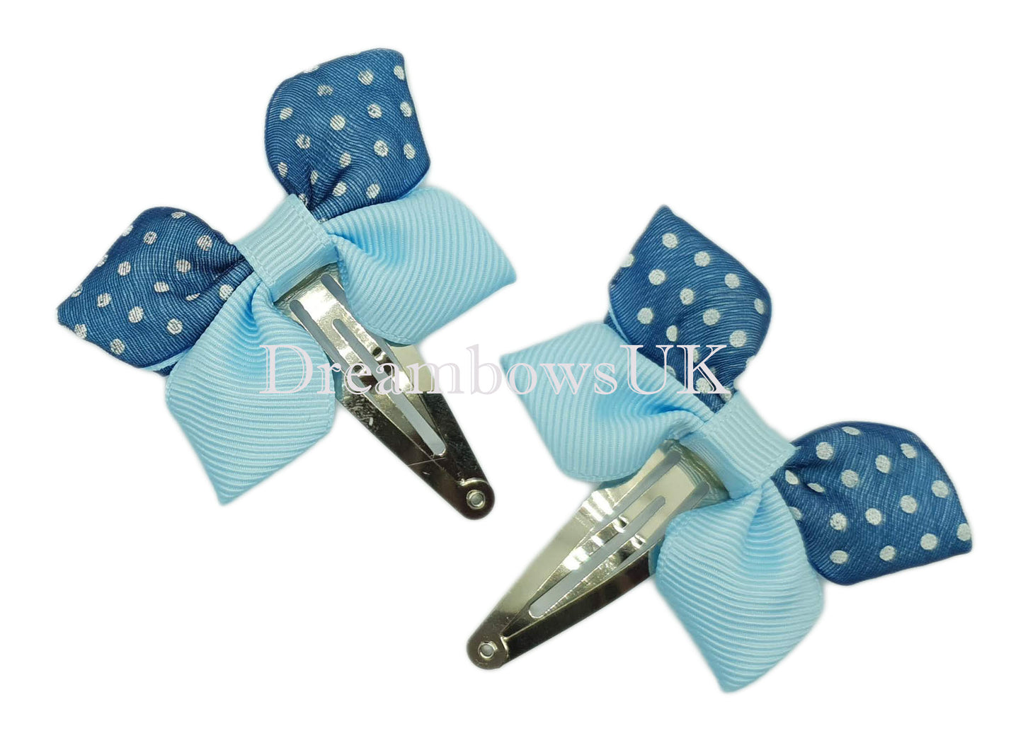 Blue polka dot hair bows on snap clips