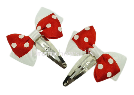 Red and white spotty bows on snap clips