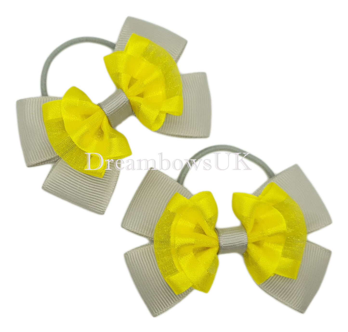 Silver and yellow hair bows, thin hair elastics