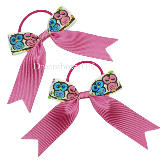 Pink and turquoise owl design hair bows on thin bobbles