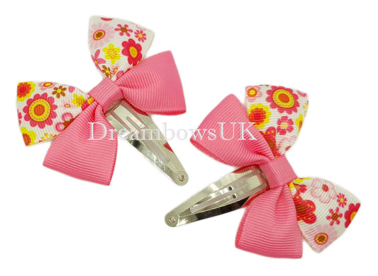 Pink floral hair bows on snap clips