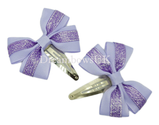 Purple and lilac glitter hair bows, snap clips
