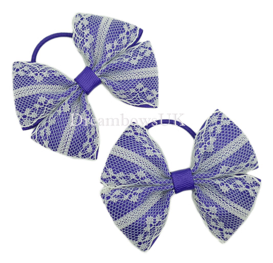 Purple lace hair bows on thin bobbles
