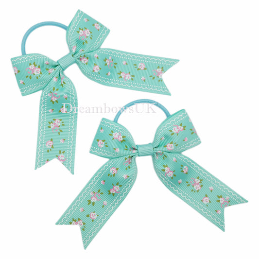 Pastel green floral hair bows, thin bobbles