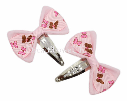 Baby pink butterfly hair bows, snap clips