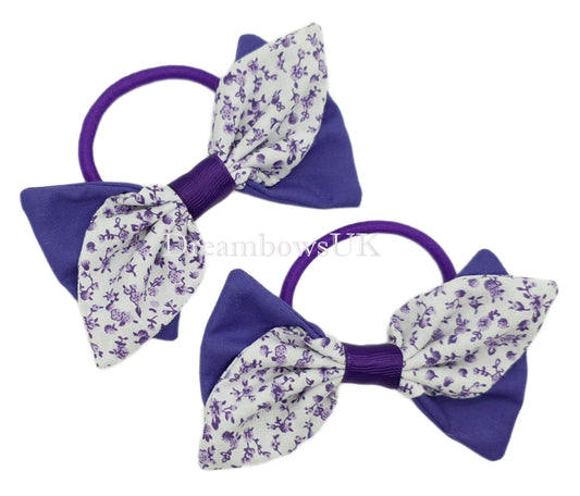 Purple and white floral hair bows on thick bobbles