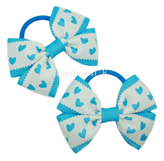Turquoise and white hair bows on thick bobbles