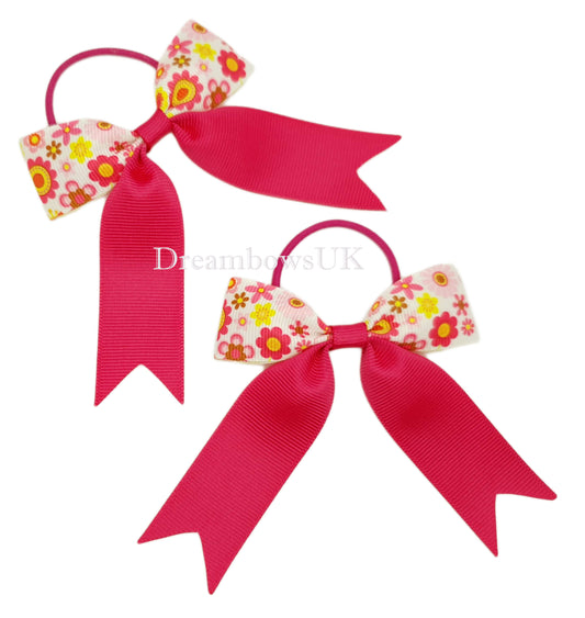 Pink and white floral hair bows on thin bobbles 