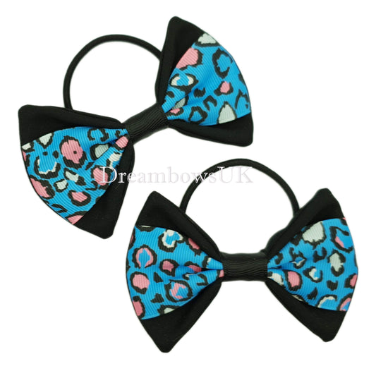 Black and blue leopard print hair bows on thick bobbles
