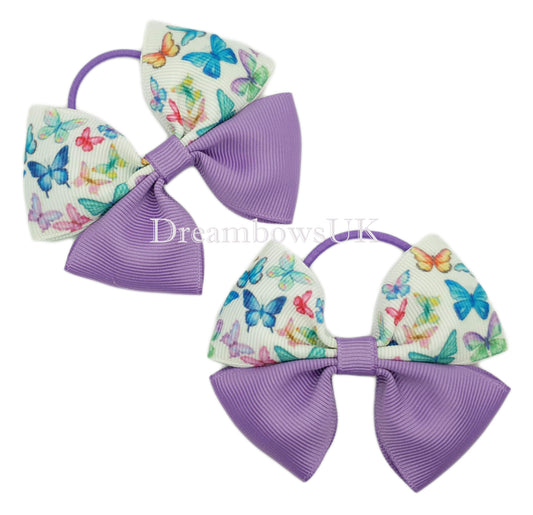 Purple butterfly hair bows on thin bobbles