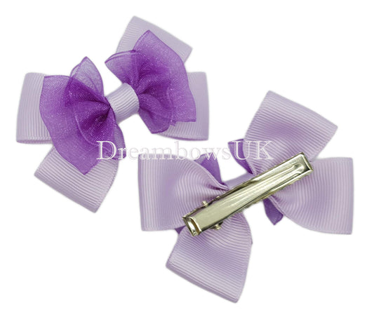 Purple and lilac organza hair bows on alligator clips