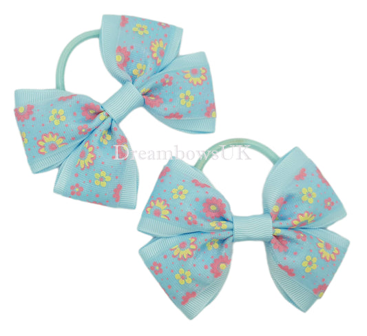 Baby blue floral hair bows on thick bobbles
